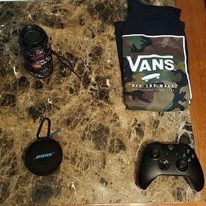 Van's shirt, controller, bose, speaker